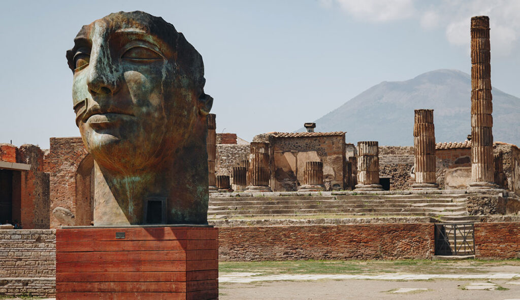 Sculpture of the face in Pompeii, day trips from Rome.