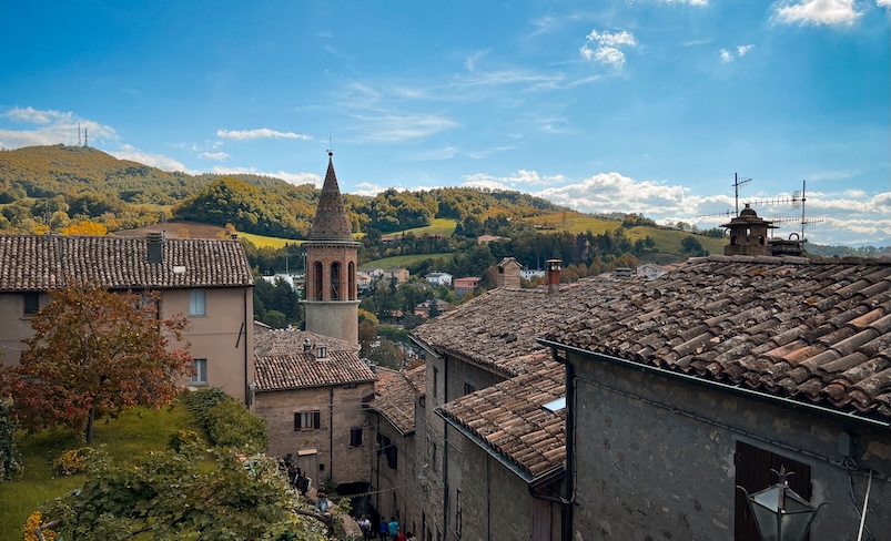 Bell tower of Sant’Agata Feltria with Marecchia hills in the background