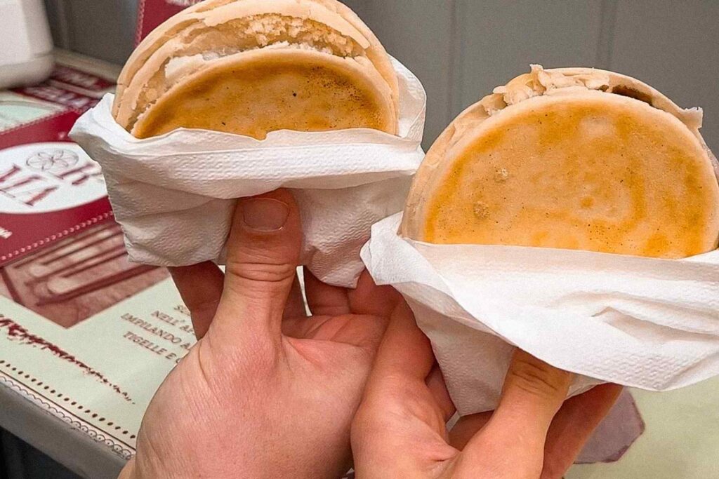 Crescentine sandwiches with creamy filling in Modena, Emilia-Romagna