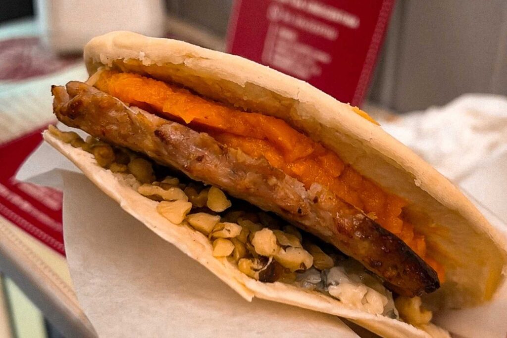 Modena crescentina filled with sausage, pumpkin and pistachios