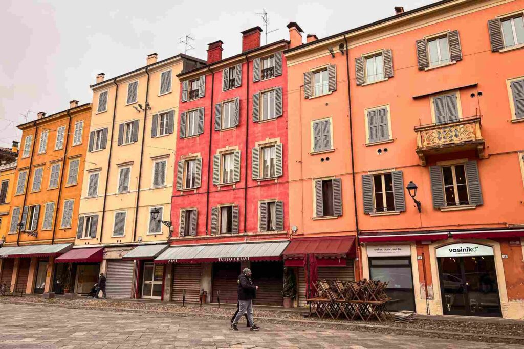 Colorful historic facades in central Modena, Italy