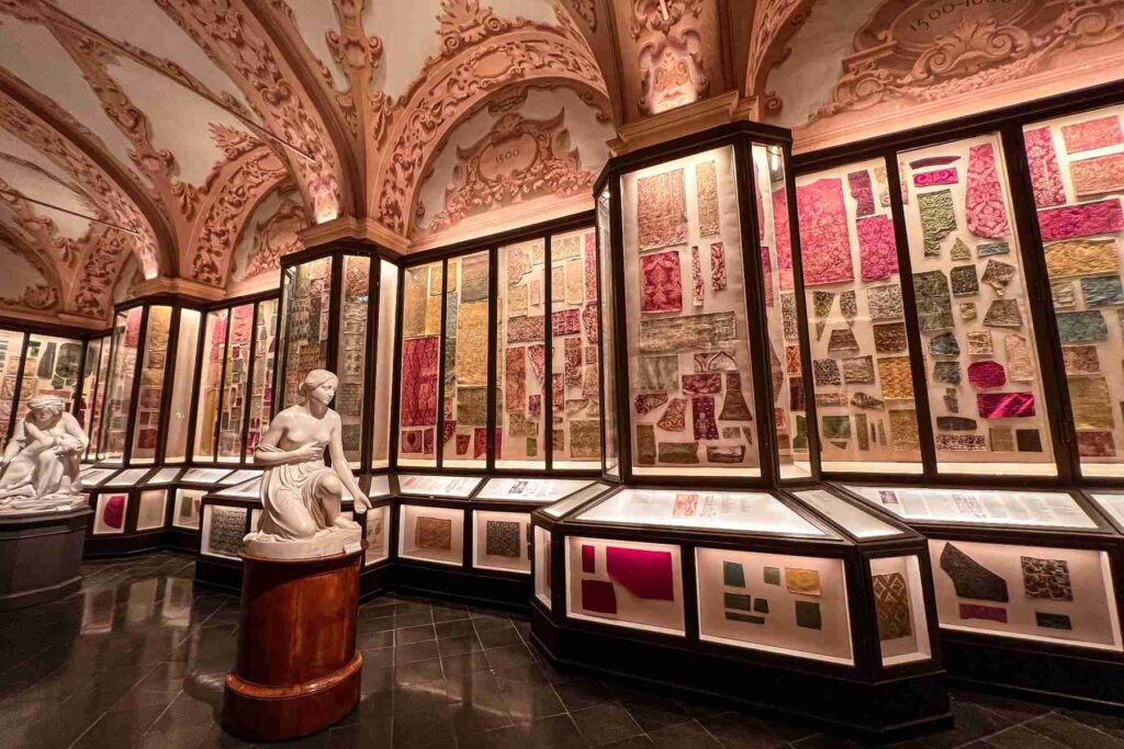 Textile and sculpture gallery inside a Modena museum