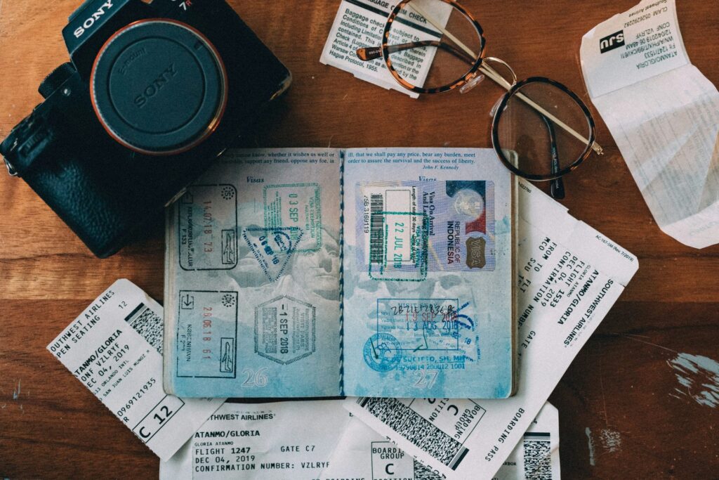 Travel documents and identification card for choosing travel insurance before visiting Italy